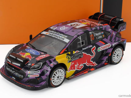 Ford Puma RALLY1 Team Ford M-Sport (night Version) N°13 Rally Montecarlo 2025 Louis Louka - Gregoire Munster 1:18 IXO Models modrá žltá červená