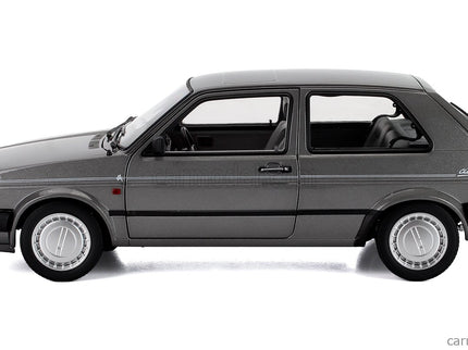 Volkswagen Golf II Champion 1989 1:18 Norev sivá metalická
