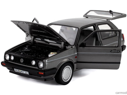 Volkswagen Golf II Champion 1989 1:18 Norev sivá metalická