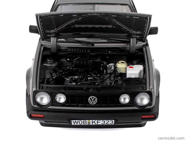 Volkswagen Golf II Champion 1989 1:18 Norev sivá metalická