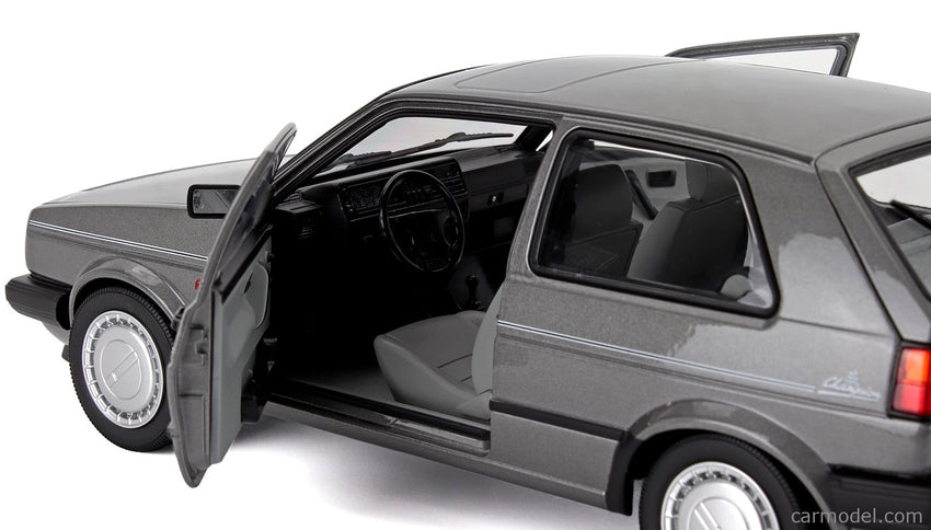 Volkswagen Golf II Champion 1989 1:18 Norev sivá metalická