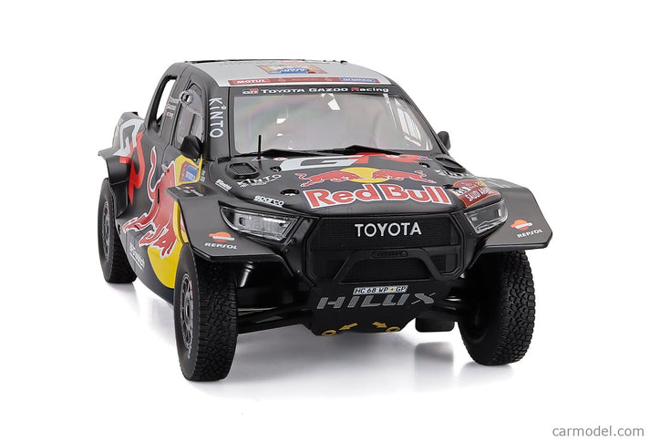 Toyota GR Dkr Hilux Team Toyota Gazoo Racing N°216 Rally Dakar 2024 Seth Quinter - Dennis Zenz 1:18 IXO Models čierna žltá červená