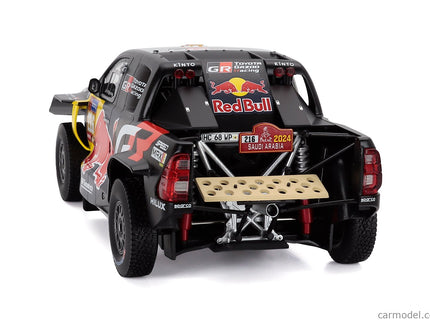 Toyota GR Dkr Hilux Team Toyota Gazoo Racing N°216 Rally Dakar 2024 Seth Quinter - Dennis Zenz 1:18 IXO Models čierna žltá červená