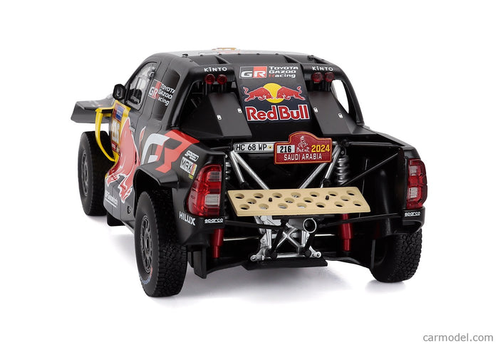 Toyota GR Dkr Hilux Team Toyota Gazoo Racing N°216 Rally Dakar 2024 Seth Quinter - Dennis Zenz 1:18 IXO Models čierna žltá červená