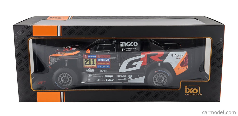 Toyota GR Dkr Hilux Team Toyota Gazoo Racing N°211 Rally Dakar 2025 Henk Lategan - Brett Cummings 1:18 IXO Models čierna oranžová červená