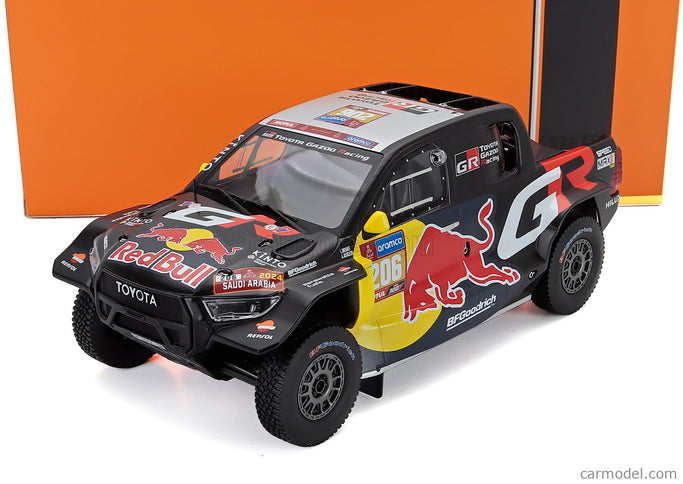 Toyota GR Dkr Hilux Team Toyota Gazoo Racing N°206 Rally Dakar 2024 Lucas Moraes - Armand Monleon 1:18 IXO Models čierna žltá červená