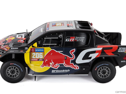 Toyota GR Dkr Hilux Team Toyota Gazoo Racing N°206 Rally Dakar 2024 Lucas Moraes - Armand Monleon 1:18 IXO Models čierna žltá červená