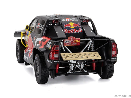 Toyota GR Dkr Hilux Team Toyota Gazoo Racing N°206 Rally Dakar 2024 Lucas Moraes - Armand Monleon 1:18 IXO Models čierna žltá červená