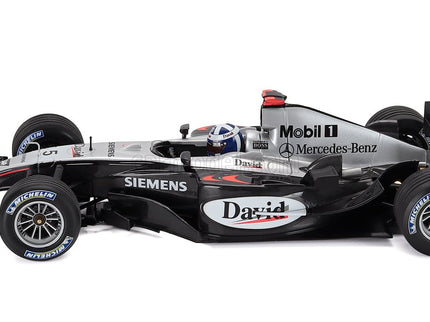 Mclaren F1 MP4/19 N°5 Sezóna 2004 David Coulthard 1:18 Minichamps čierna strieborná