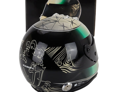 Schuberth Helmet Helma F1 Mick Schumacher Team AMG Petronas Motorsport N°47 (third Pilot) Sezóna 2024 1:2 Mini Helmet zlatá zelená čierna