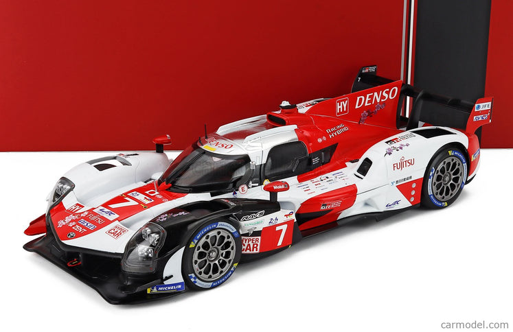 Toyota GR010 3.5L V6 Twin Turbo Hybrid Team Gazoo Racing N°7 24h Le Mans 2023 Mike Conway - Kamui Kobayashi - Jose Maria Lopez 1:18 IXO Models biela červená