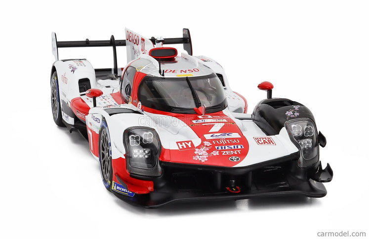 Toyota GR010 3.5L V6 Twin Turbo Hybrid Team Gazoo Racing N°7 24h Le Mans 2023 Mike Conway - Kamui Kobayashi - Jose Maria Lopez 1:18 IXO Models biela červená